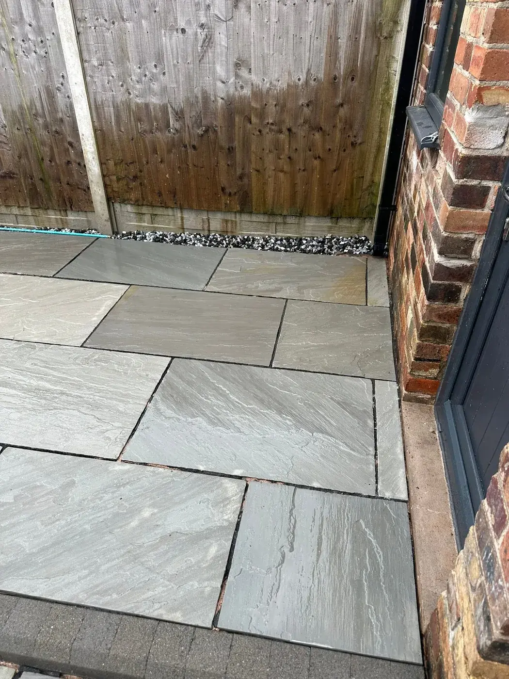 The same patio paving after pressure washing