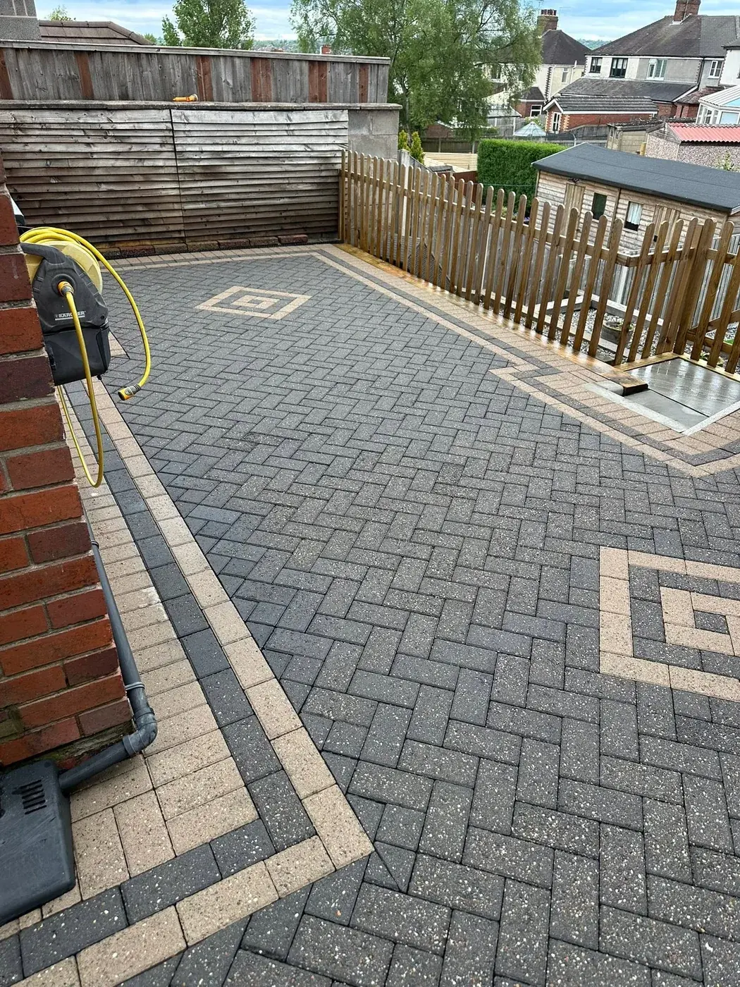 Freshly cleaned patterned driveway